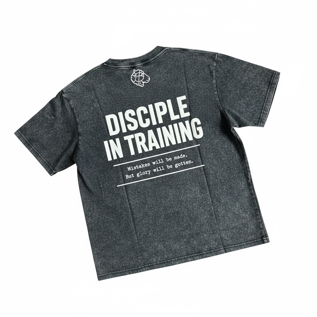 The Promise Brand Co. charcoal mineral-wash crewneck t-shirt featuring Disciple in Training graphic on the back